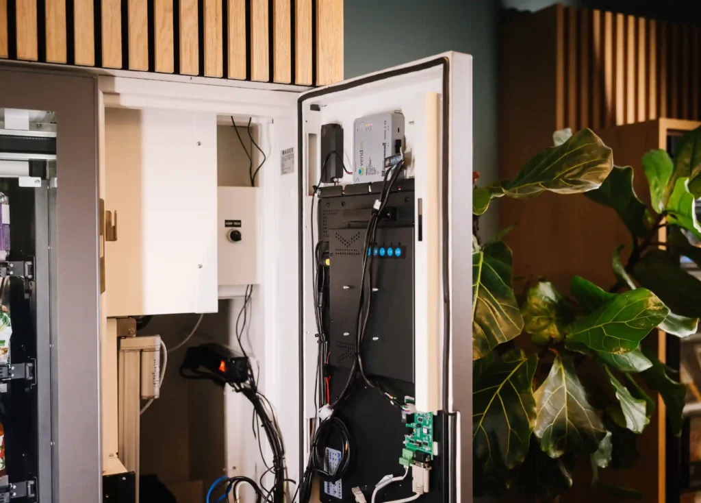 Vending machine with open doors during technical visit