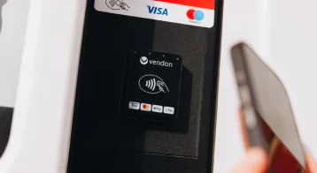 Vendon contactless card reader mounted on vending machine close-up